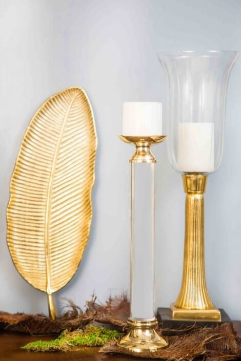 Złote dodatki w białych pomieszczeniach